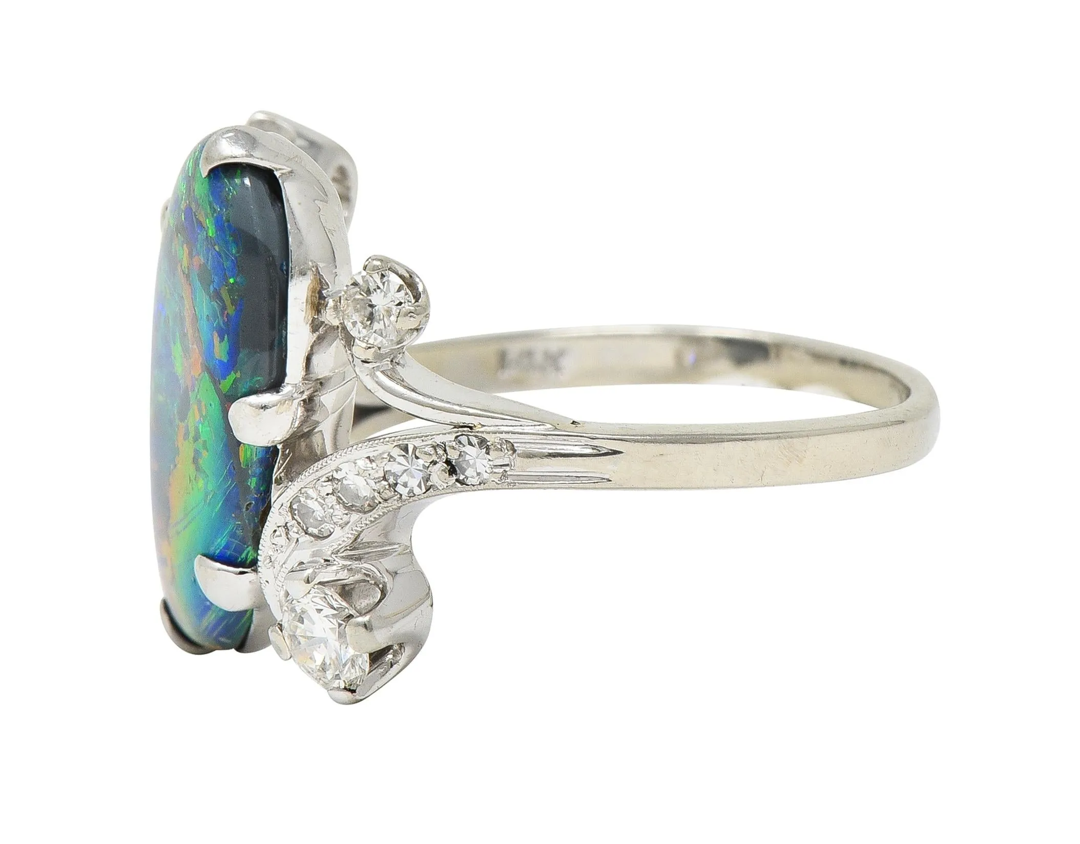 1950's Black Opal Diamond 14 Karat White Gold Scrolling Navette Bypass Ring