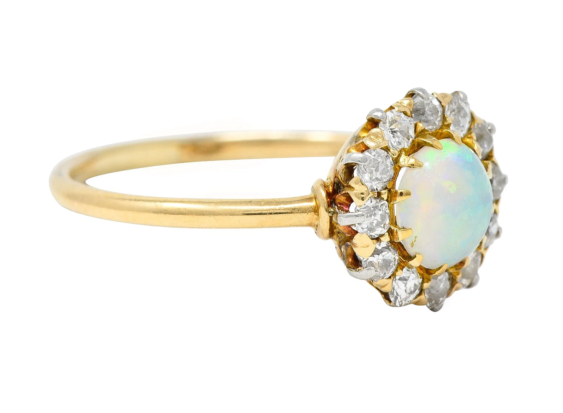 Edwardian Opal Cabochon Old European Cut Diamond Platinum-Topped 18 Karat Yellow Gold Antique Halo Ring