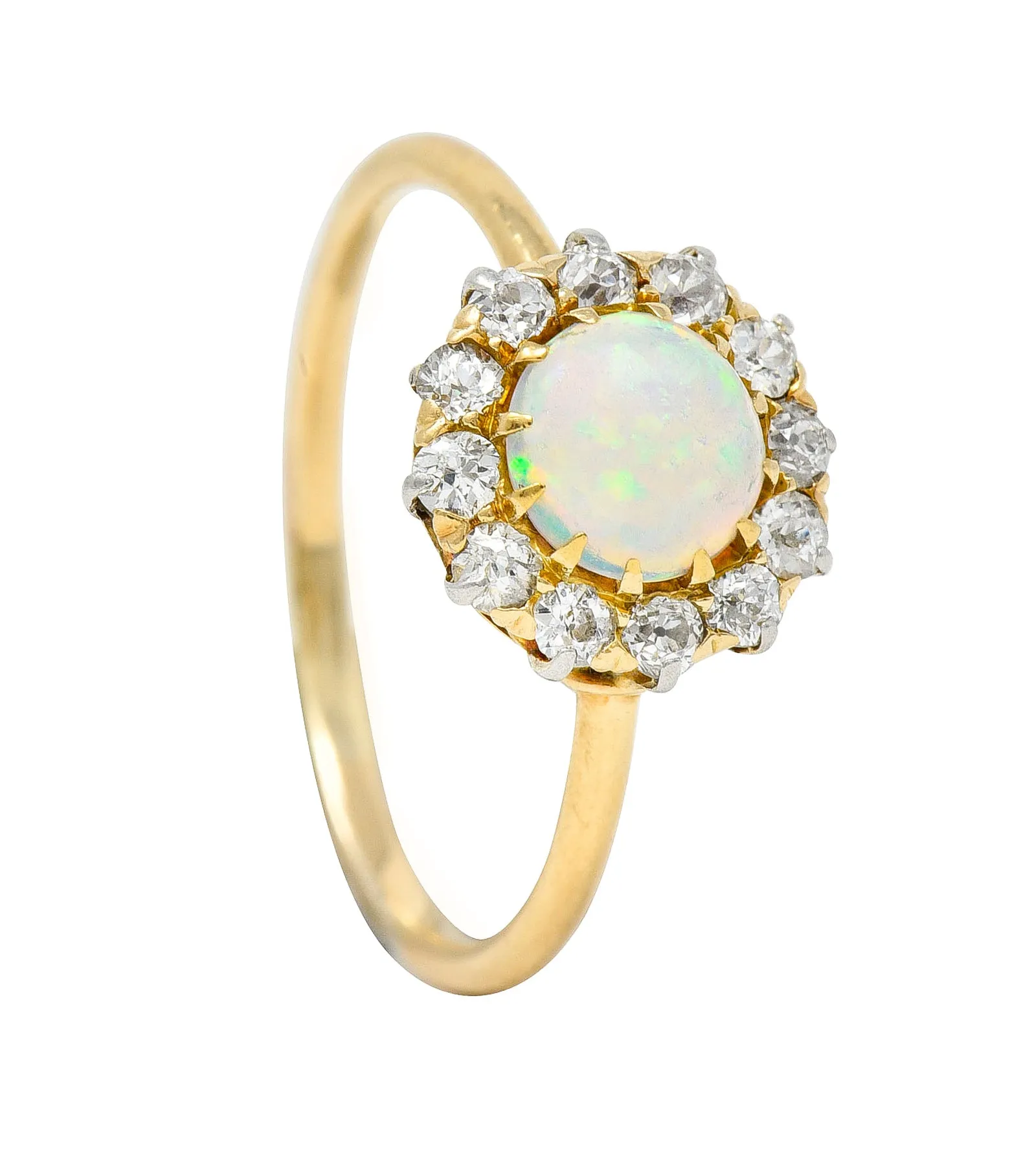 Edwardian Opal Cabochon Old European Cut Diamond Platinum-Topped 18 Karat Yellow Gold Antique Halo Ring