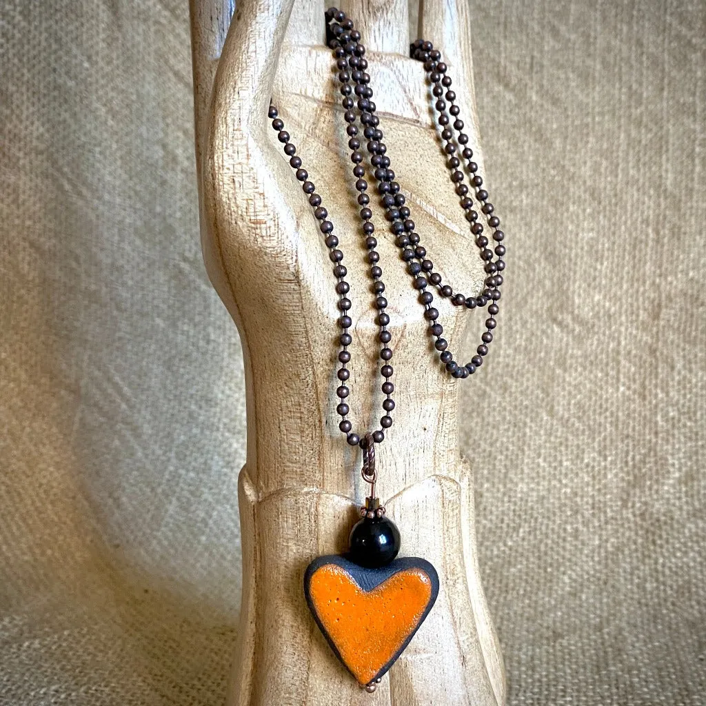 Orange Stoneware Heart Pendant with Shungite Bead on Copper Ball Chain