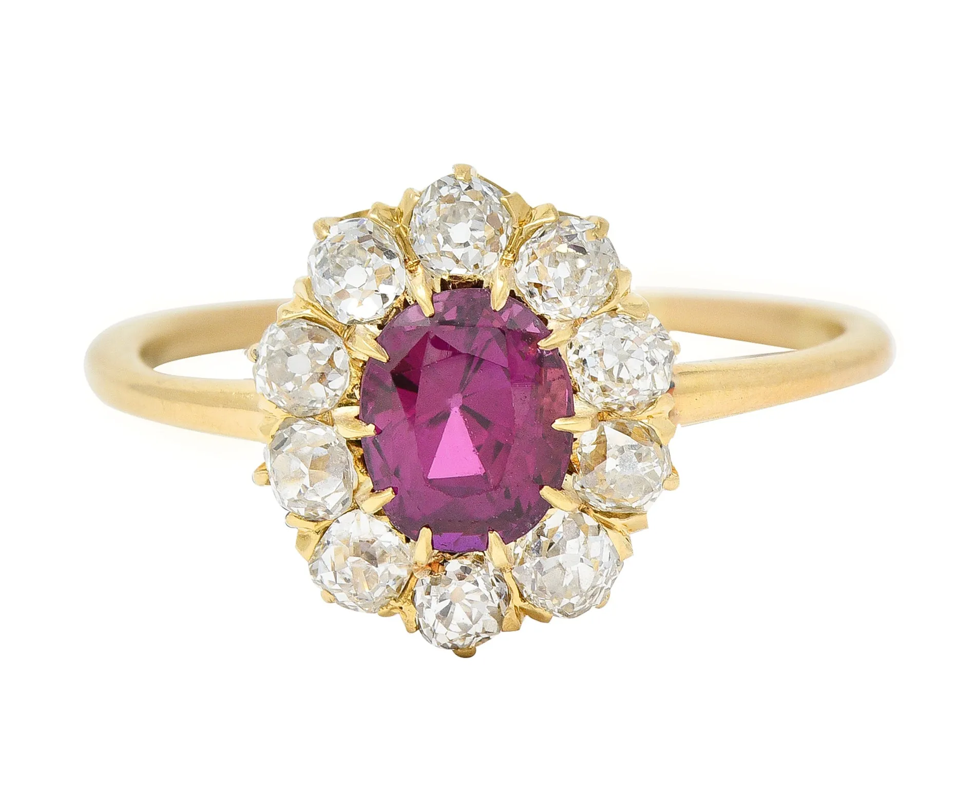 Victorian 1.82 CTW Oval Cut Ruby Old Mine Cut Diamond 14 Karat Yellow Gold Antique Cluster Ring