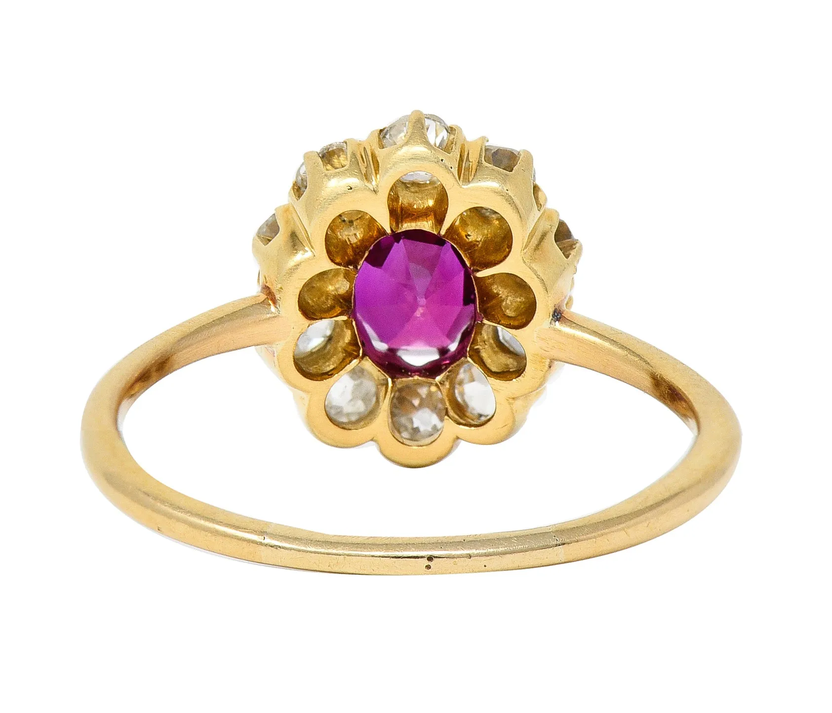 Victorian 1.82 CTW Oval Cut Ruby Old Mine Cut Diamond 14 Karat Yellow Gold Antique Cluster Ring