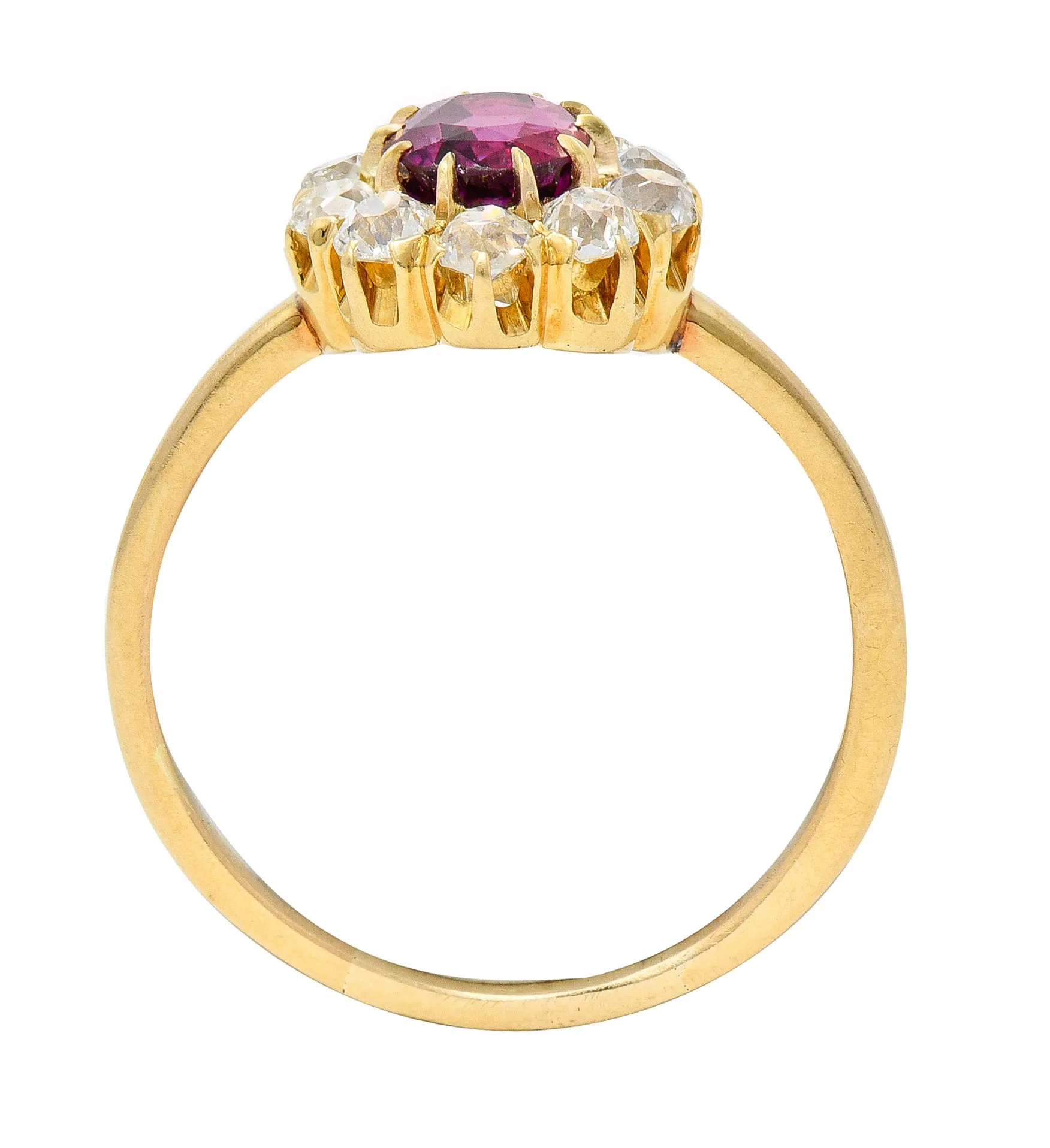 Victorian 1.82 CTW Oval Cut Ruby Old Mine Cut Diamond 14 Karat Yellow Gold Antique Cluster Ring