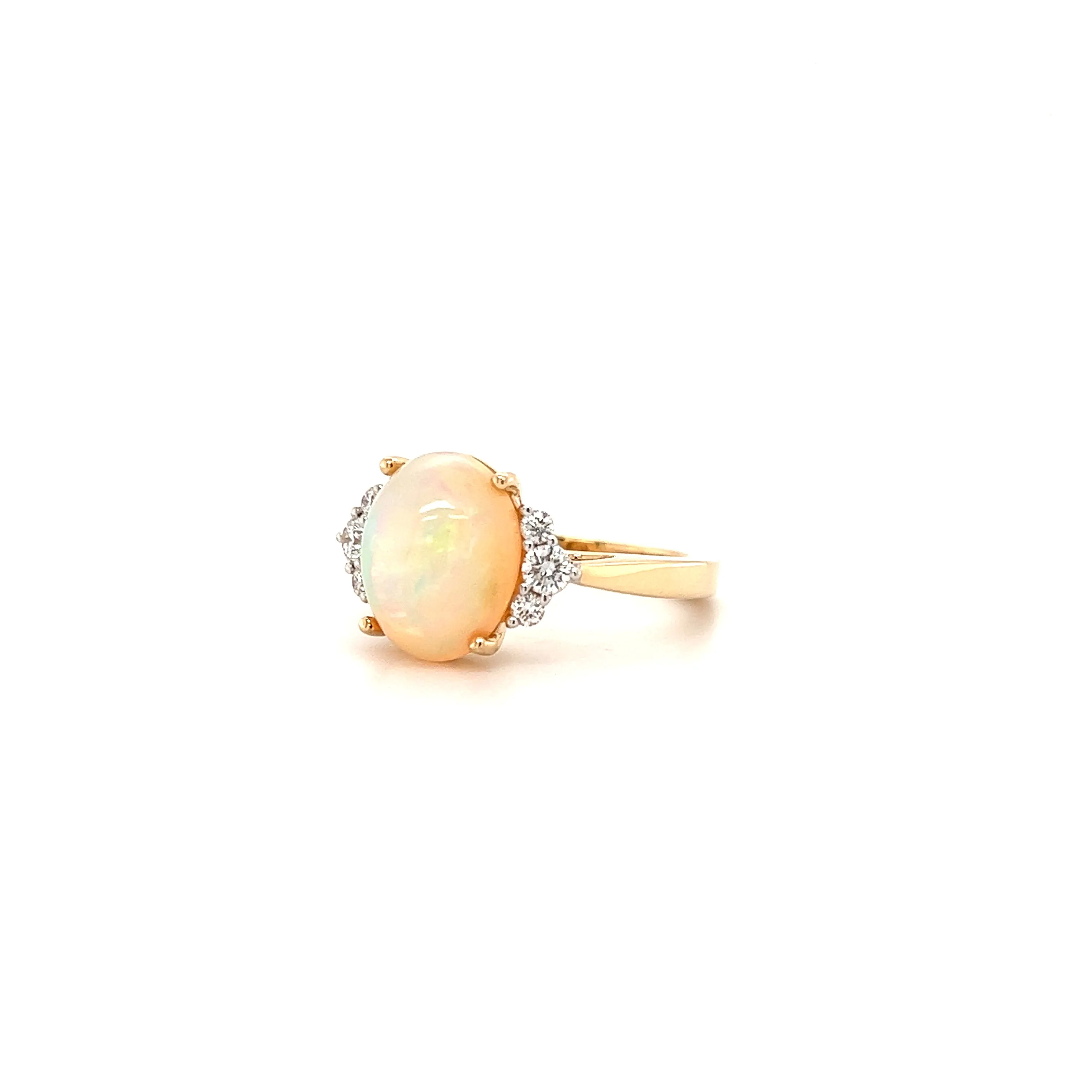 White Ethiopian Opal Ring with Six Side Diamonds in 14K Yellow Gold